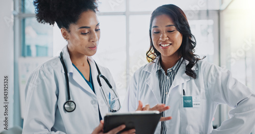 Women, doctors and happy with tablet in hospital for patient information, appointment and schedule. Database, medical and healthcare practitioner with technology for telehealth, service and medicine