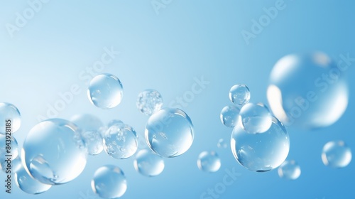 Crystal clear bubbles float in a serene blue background, creating a tranquil and refreshing visual atmosphere.