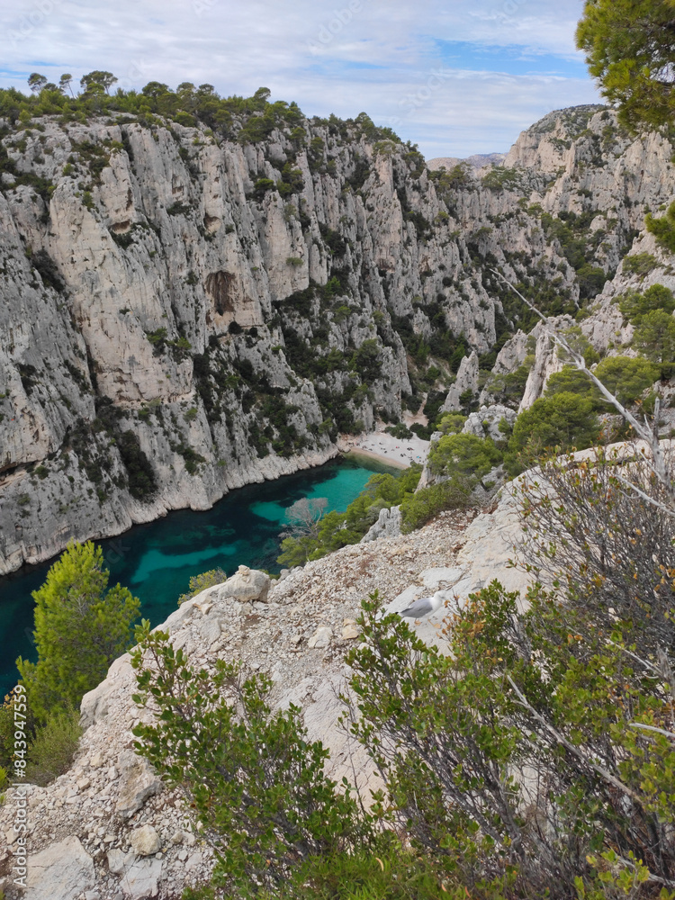 The Calanques National Park is a French national park located on the Mediterranean coast in Bouches-du-Rhône, Southern France. The beach of En-Vau and it's high limestone cliffs near Cassis.