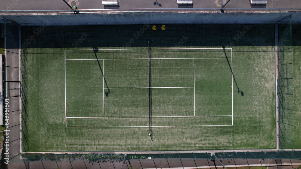 Aerial view of multi-functional sports area with tennis courts in Santo Tirso, Portugal.