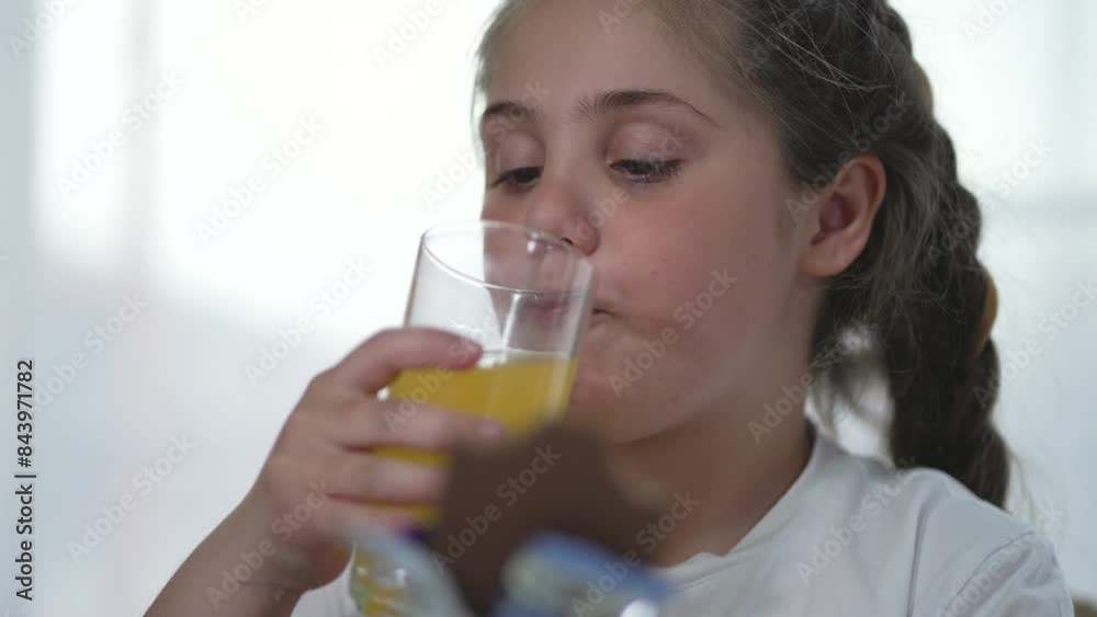 Child kitchen enjoys dessert sips fresh juice. Child savors sweet treat and juice blissful moment at home. Happy child kitchen with dessert juice. Child delighted with sweet treat drinking juice home. Child kitchen enjoys dessert sips fresh juice. Child savors sweet treat and juice blissful moment at home. Happy child kitchen with dessert juice. Child delighted with sweet treat drinking juice home.