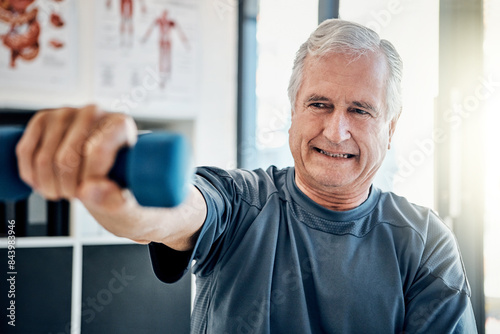 Fitness, physio and old man with dumbbell, health and stretching at senior rehabilitation clinic. Physiotherapy, weights and elderly patient in mobility training, exercise or wellness in retirement © peopleimages.com