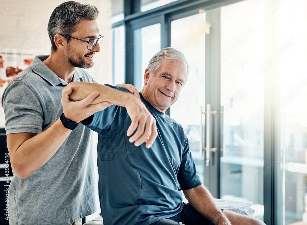 Obraz premium Healthcare, physiotherapist and old man with arm massage, stretching and help in senior rehabilitation. Physio, therapist and elderly patient for mobility training, exercise or support in retirement