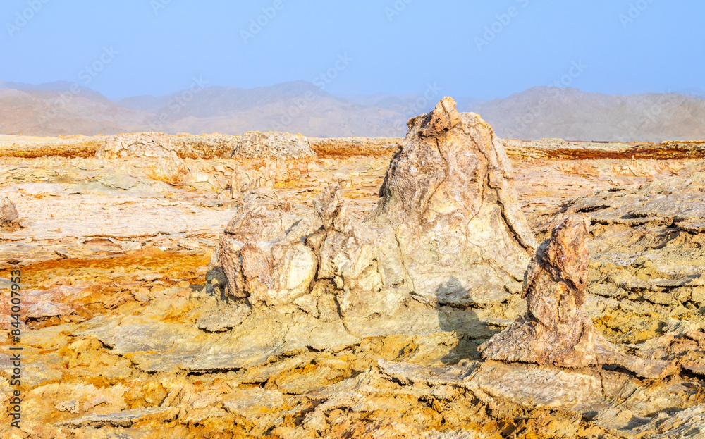 Fototapeta premium Frozen magma and mineral fields volcanic landscape, Danakil Depression desert, Afar triangle region, Ethiopia
