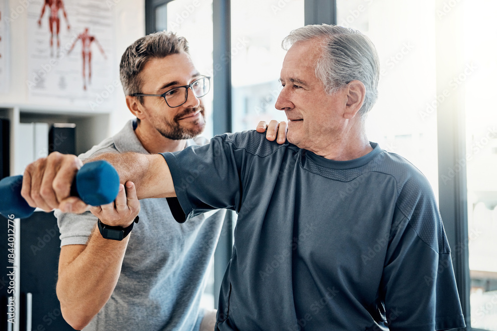Fototapeta premium Dumbbell, senior man and physiotherapy support with healthcare, wellness and client assessment at doctor. Consultation, rehabilitation and weights for physical therapy and recovery of patient