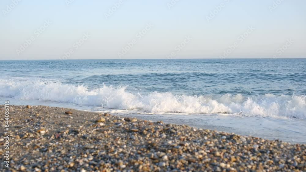 Mediterranean seaside coast in calm weather on blue sky background. Mediterranean seaside coast in calm weather on blue sky background.