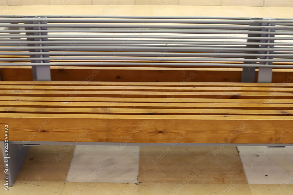 A bench for relaxing in a city park on the seashore. A bench for relaxing in a city park on the seashore.