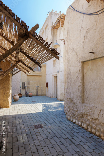 traditional Arabic architecture in the old town of Dubai, Al Fahidi Historical district in Dubai Creek photo