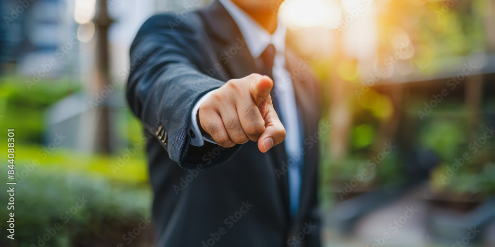 Businessman pointing finger in focus Businessman pointing finger in focus