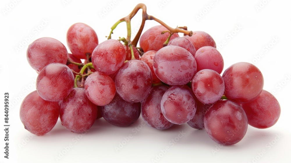 Bunch of red grapes isolated on a white background Bunch of red grapes isolated on a white background