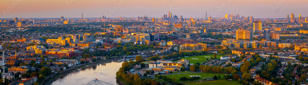 Naklejka premium Aerial view of the City of London cityscape at sunset, England