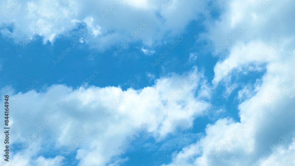 Blue sky with white clouds, bright colored cloudscape banner. Fluffy heaven pattern, aesthetic natural scene. Beautiful Cloudy background, nature environment wallpaper, panoramic view Blue sky with white clouds, bright colored cloudscape banner. Fluffy heaven pattern, aesthetic natural scene. Beautiful Cloudy background, nature environment wallpaper, panoramic view