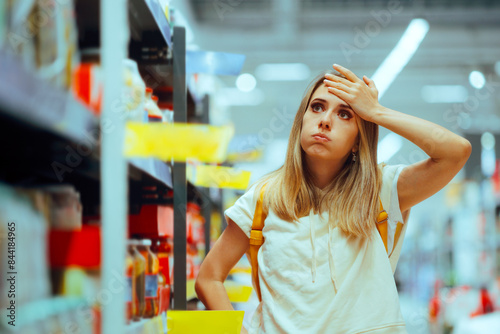 Konstfotografi Stressed Woman Checking Inflated Prices in a Supermarket