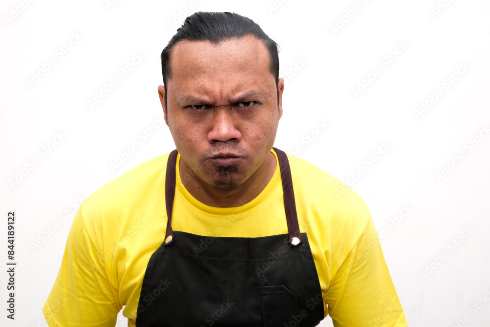 portrait of an angry or serious facial expression of an Asian man