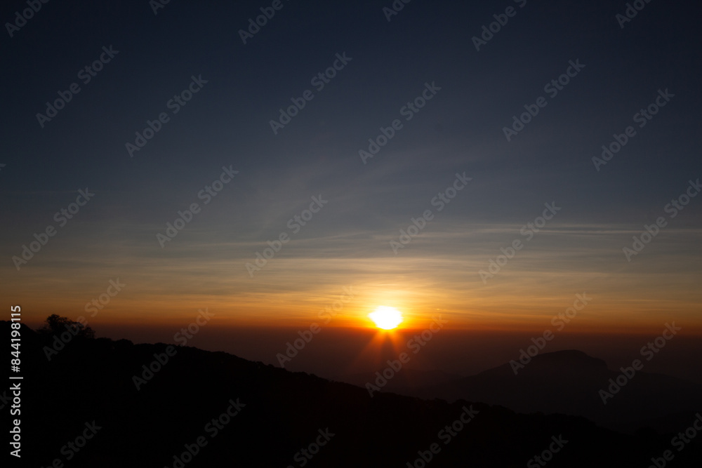 Fototapeta premium sunset over the mountains