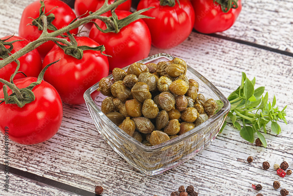 Marinated green capers in the bowl Marinated green capers in the bowl