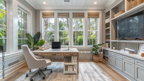 Home office with large windows, natural light, and a view of the backyard. photo