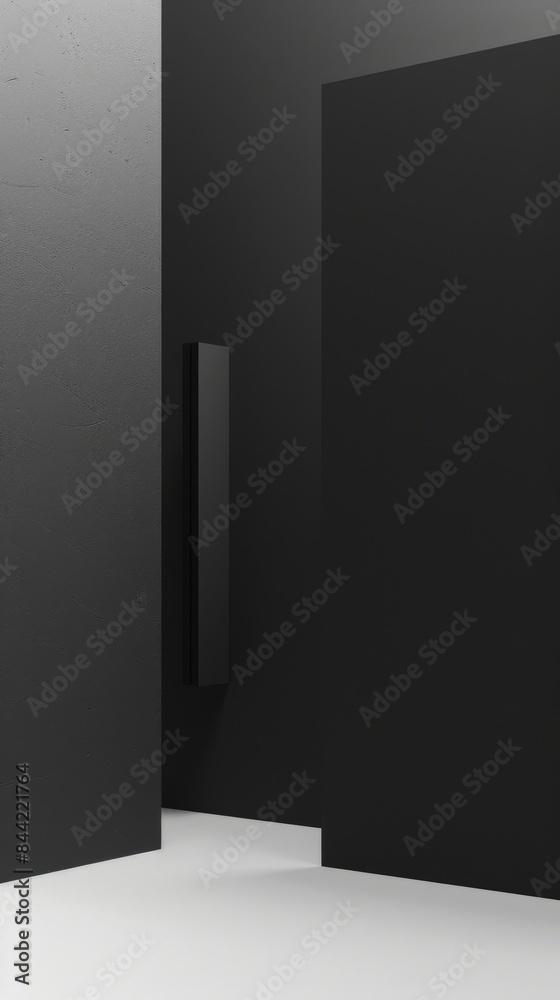 A black door with a silver handle is in front of a wall. The door is closed and the wall is made of concrete A black door with a silver handle is in front of a wall. The door is closed and the wall is made of concrete