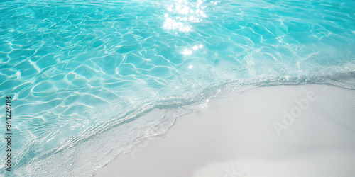 Fototapeta Naklejka Na Ścianę i Meble -  Turquoise water and white sand beach. Crystal clear turquoise water gently laps against a pristine white sand beach, creating a tranquil and inviting scene