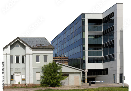 A new modern building was built next to a destroyed old house isolated