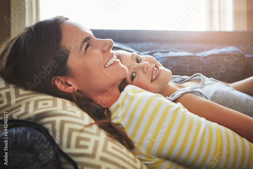 Fotografija Love, smile and mother cuddle her child while relaxing on sofa in the living room of their home
