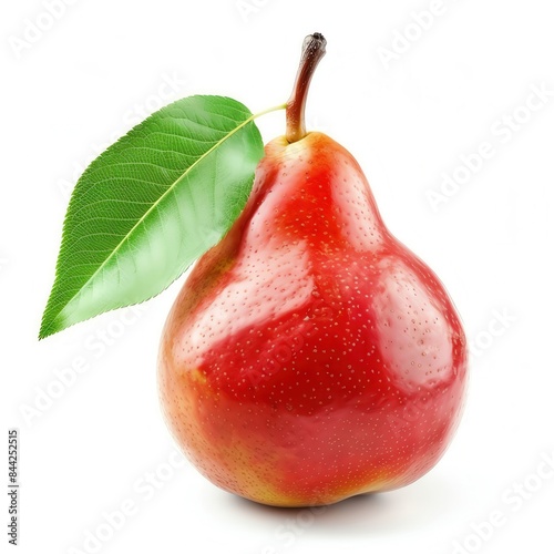 A ripe, vibrant pear with a green leaf, isolated on a white background photo