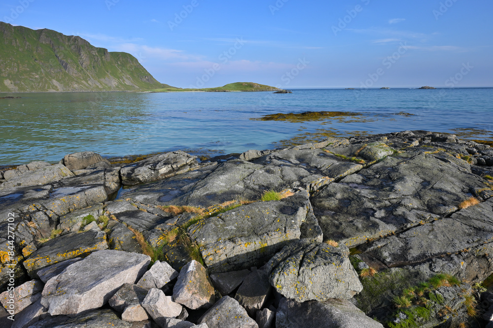 Stones and rocks at fjord shore, Lofoten islands.