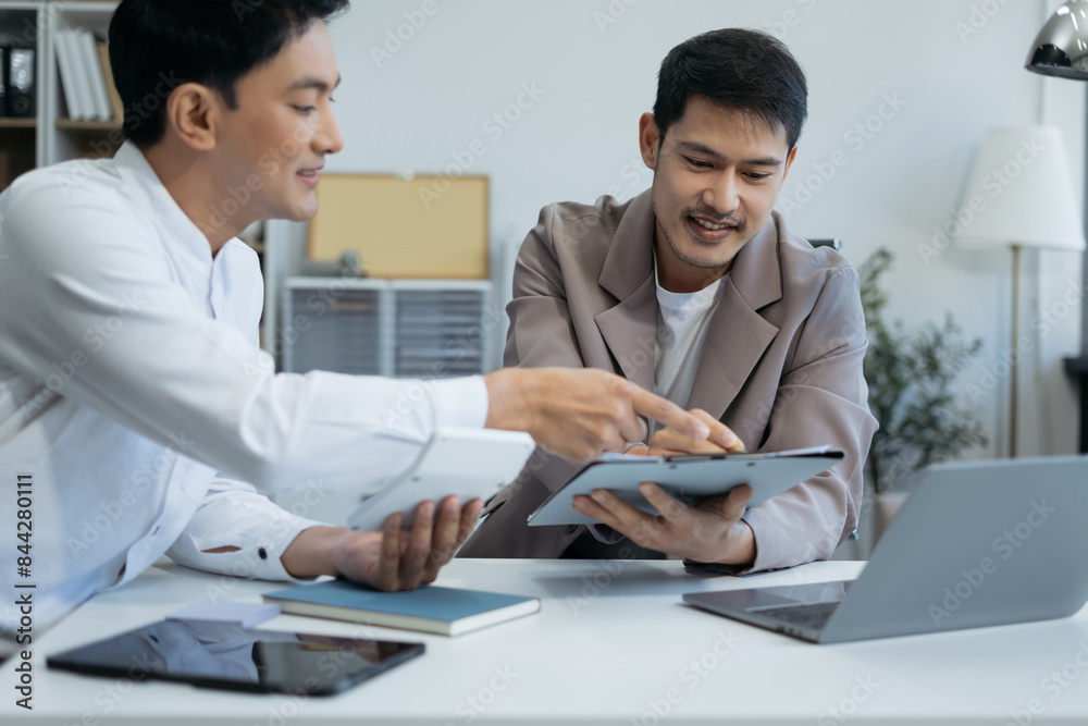 Business people discussing on performance revenue in meeting. businessman working with co-worker team. financial adviser analysing data with investor. Business people discussing on performance revenue in meeting. businessman working with co-worker team. financial adviser analysing data with investor.
