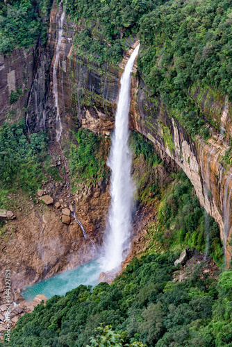 Fototapeta Naklejka Na Ścianę i Meble -  Cherrapunji, one of the wettest places on earth, is home to the stunning Nohkalikai Falls. The Nohkalikai Falls is the tallest plunge waterfall in India.