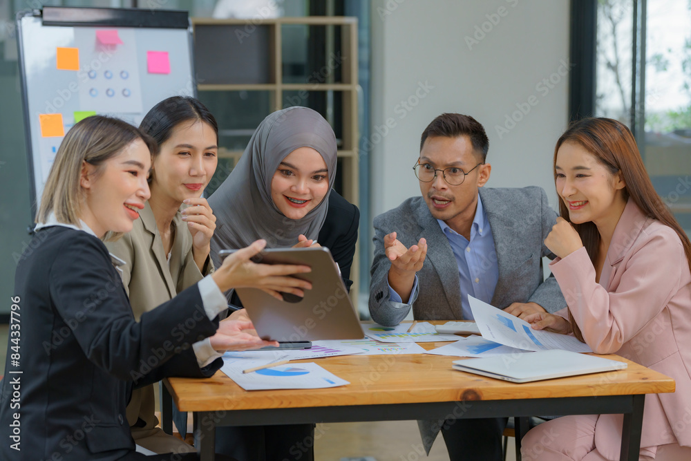 Group of business people having a meeting in a tech company. Creative business professionals planning a project in an office. Teamwork and collaboration in a modern workplace. Group of business people having a meeting in a tech company. Creative business professionals planning a project in an office. Teamwork and collaboration in a modern workplace.