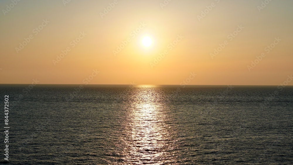 Naklejka premium 沖縄県慶良間諸島阿嘉島の新城展望台から見た夕焼け