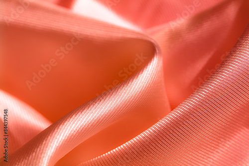 orange acetate fabric textured background photo