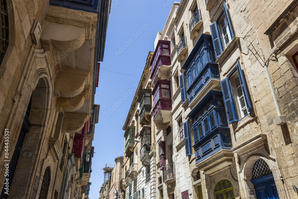 Tipical street of La Valletta with wooden terraces in Malta.