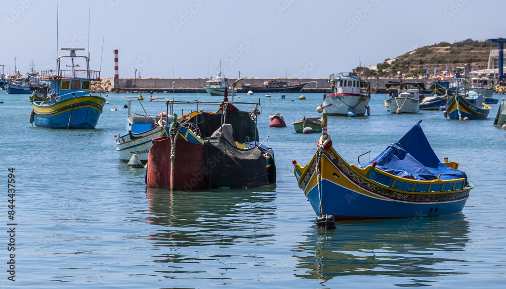 Boats into the harbour of Marsaxlokk, Malta island Boats into the harbour of Marsaxlokk, Malta island