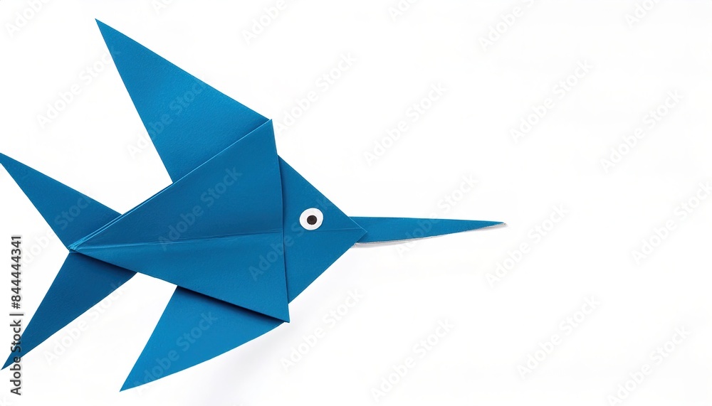 Animal aquatic water concept origami isolated on white background of a cute, adorable, sailfish - the fastest fish in the ocean. with copy space, simple starter craft for kids Animal aquatic water concept origami isolated on white background of a cute, adorable, sailfish - the fastest fish in the ocean. with copy space, simple starter craft for kids