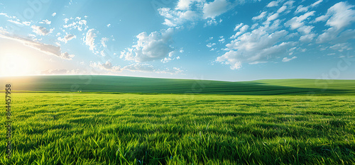 Nature landscape with green meadows, blue sky with clouds and mountains in the background. classic green landscape, Generative AI