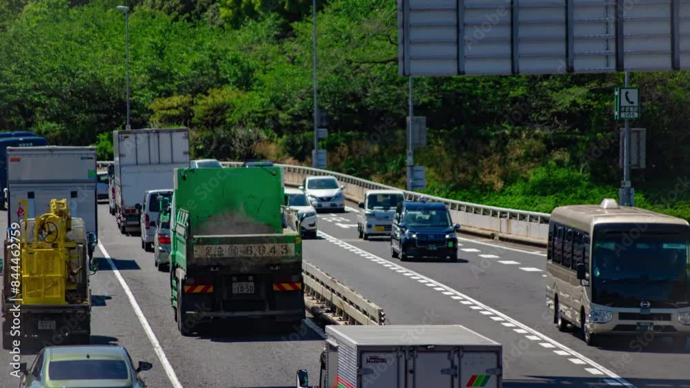 A timelapse of traffic jam at the city highway in Tokyo telephoto shot A timelapse of traffic jam at the city highway in Tokyo telephoto shot