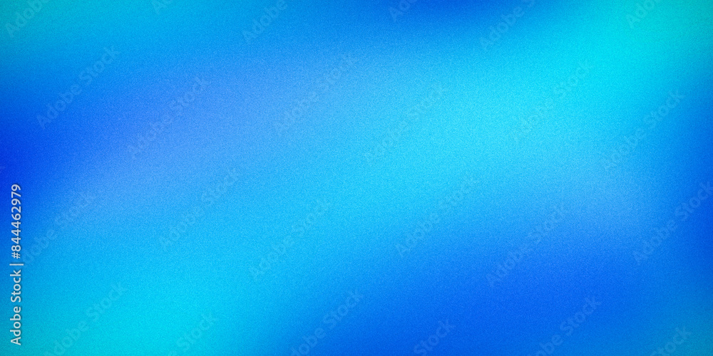 Obraz premium A vivid gradient image featuring a blend of vibrant blue and teal hues. Ideal for backgrounds, digital art, and modern design projects, creating a refreshing and dynamic visual experience