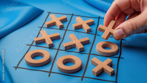 Hand Making Move in Tic-Tac-Toe