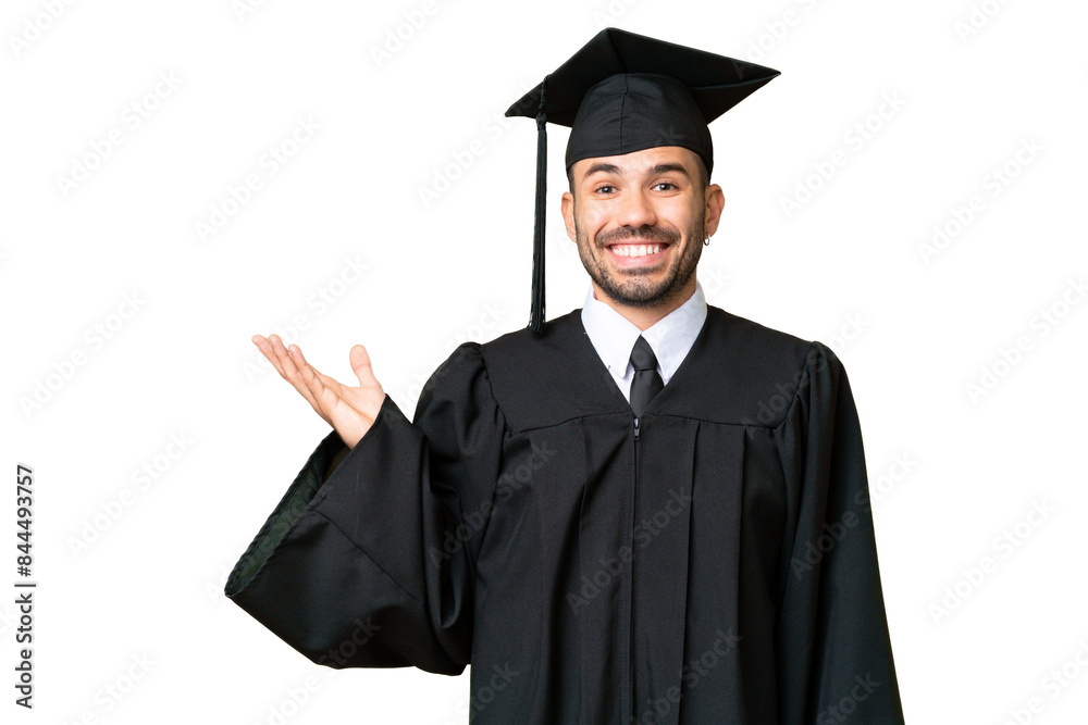 Young university graduate man over isolated chroma key background extending hands to the side for inviting to come Young university graduate man over isolated chroma key background extending hands to the side for inviting to come