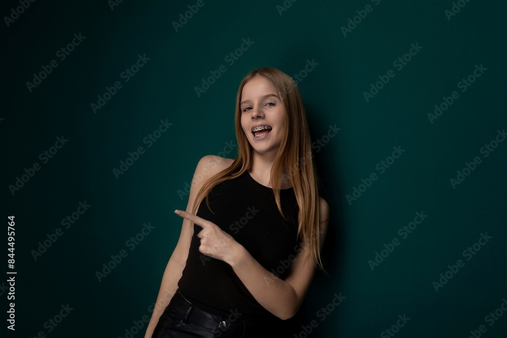 Woman in Black Top Pointing at Something