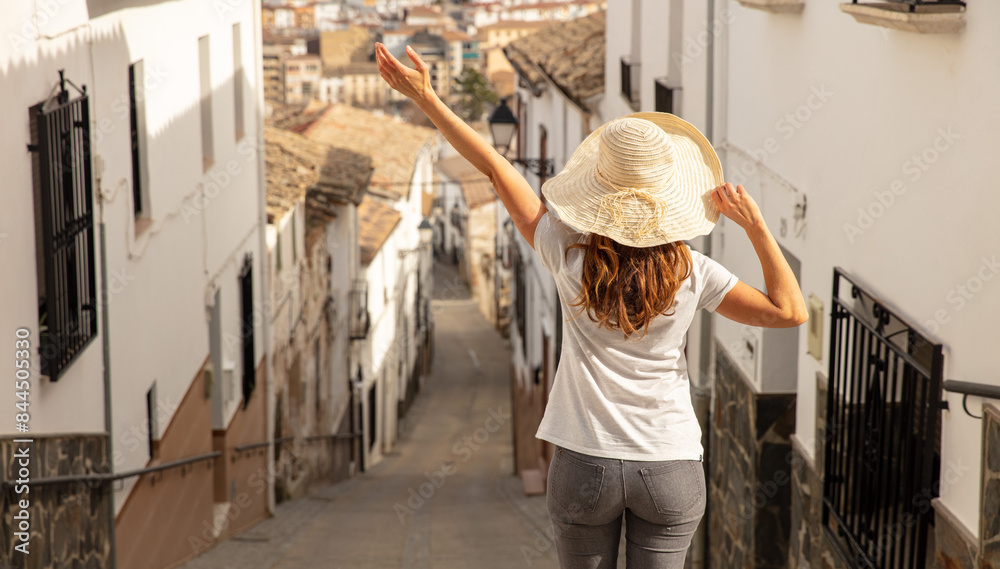 Female tourist enjoying typical village in Andalusia- Spain Female tourist enjoying typical village in Andalusia- Spain