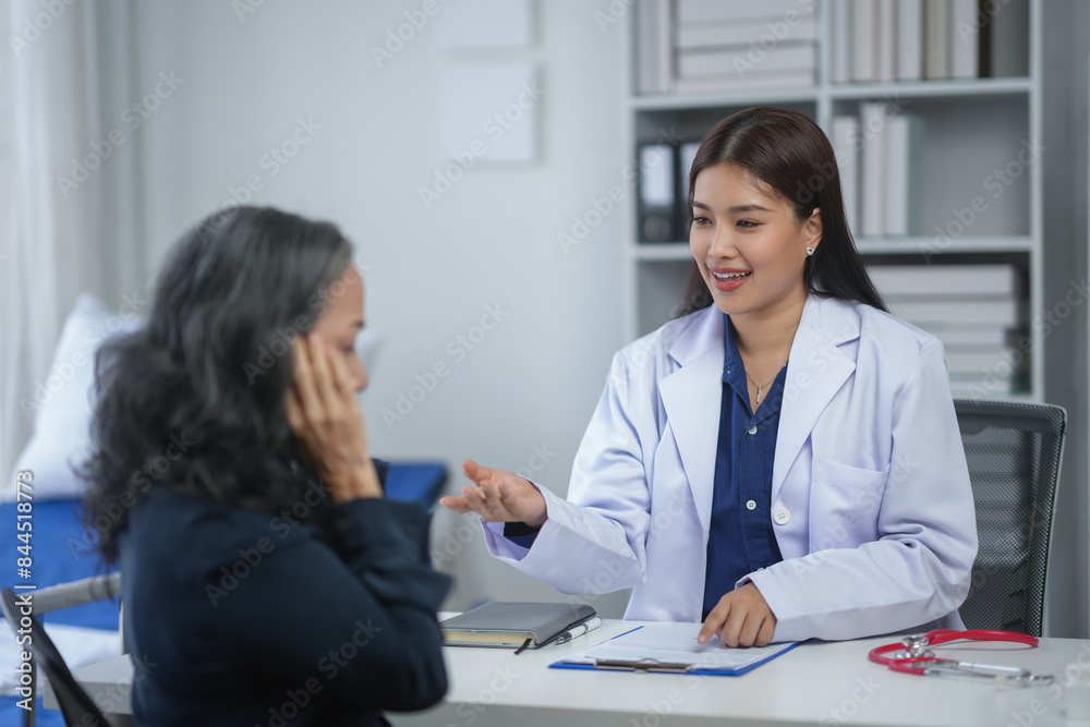 Doctor consulting senior patient in office, discussing health diagnosis and treatment options for better care. Doctor consulting senior patient in office, discussing health diagnosis and treatment options for better care.