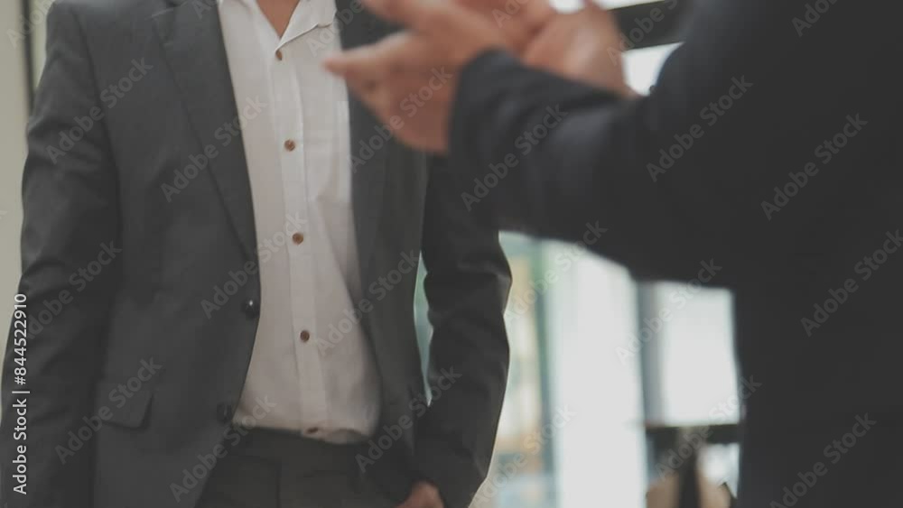 Hands of business partners applauding to reporter after listening to presentation at seminar, blurry Hands of business partners applauding to reporter after listening to presentation at seminar, blurry
