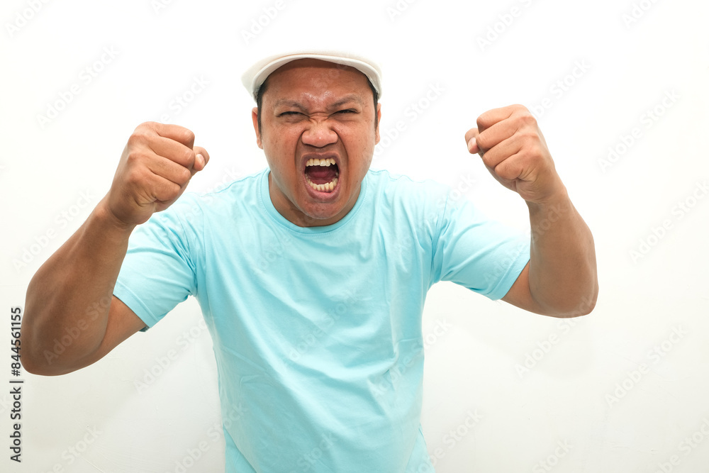 portrait of asian man wearing blue shirt being angry portrait of asian man wearing blue shirt being angry