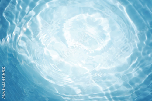 Blue water with ripples on the surface. Defocus blurred transparent blue colored clear calm water surface texture with splashes and bubbles. Water waves with shining pattern texture background.