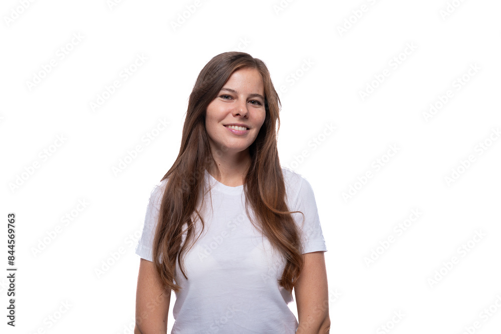 Positive pretty European woman with a bright smile on a background with copy space Positive pretty European woman with a bright smile on a background with copy space