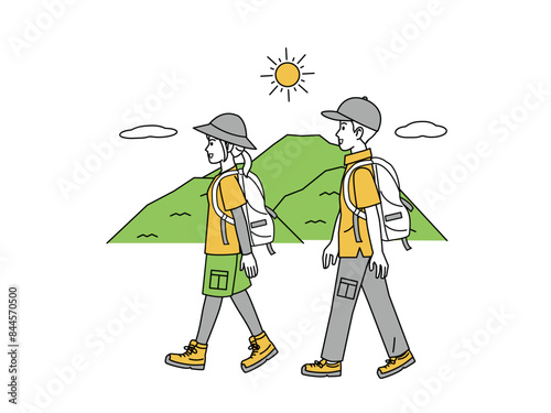 ハイキング、登山するカップルのイラスト