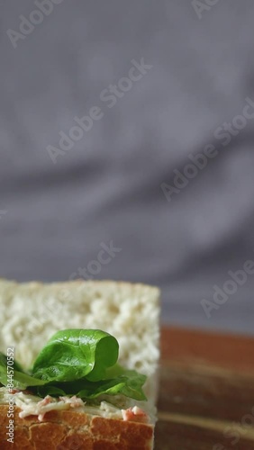 sandwich with lettuce, grey background