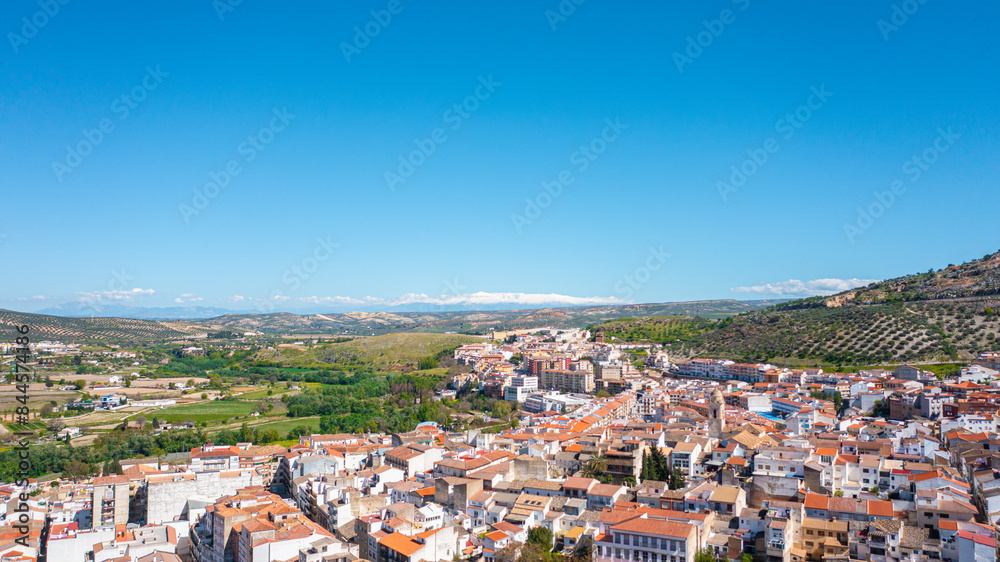 Aerial photo from drone to city of Loja and Church of the Incarnation with Moorish Alcazaba and Gorda Peak .Loja ,Granada, Andalusia, Spain, Europe (Series) Aerial photo from drone to city of Loja and Church of the Incarnation with Moorish Alcazaba and Gorda Peak .Loja ,Granada, Andalusia, Spain, Europe (Series)